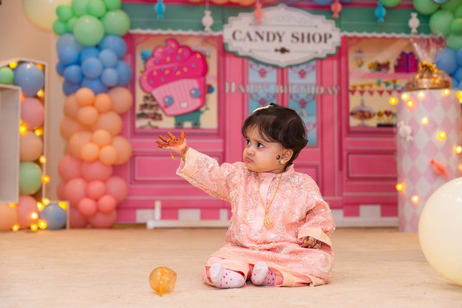 Toddler at a candy shop themed birthday